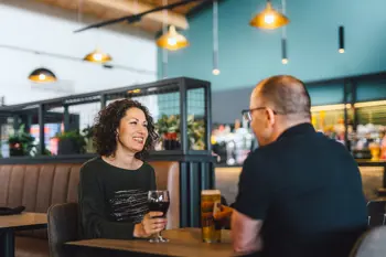 Couple enjoying drinks in The Drift Inn bar and restaurant 