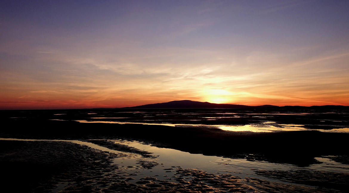 Queensberry Bay beach sunset
