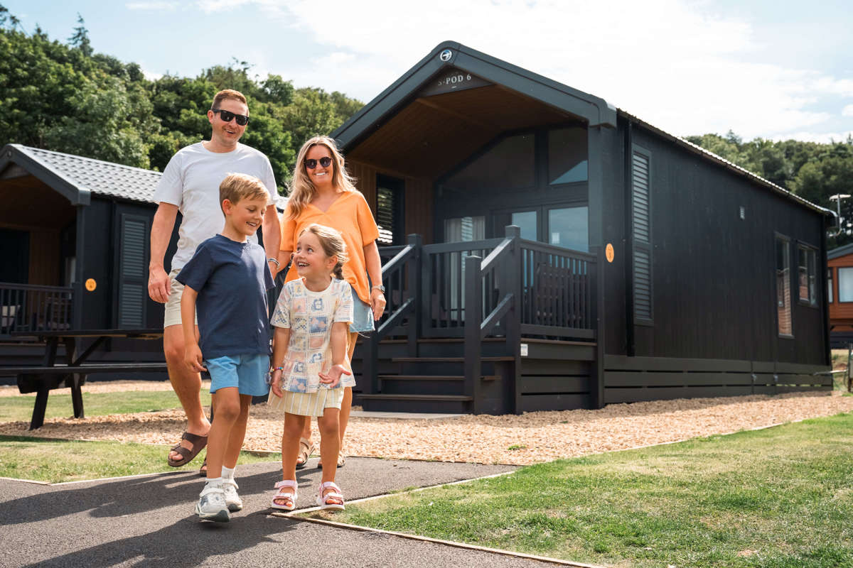 Family leaving accommodation at Thurston Manor