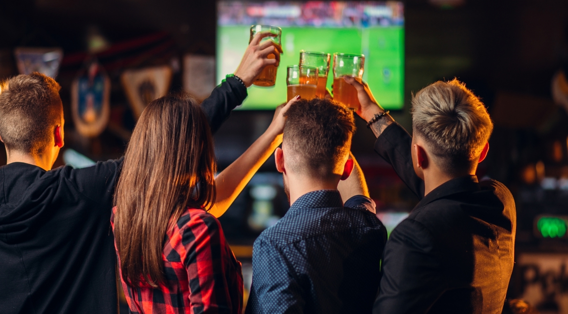 Friends watching live sports
