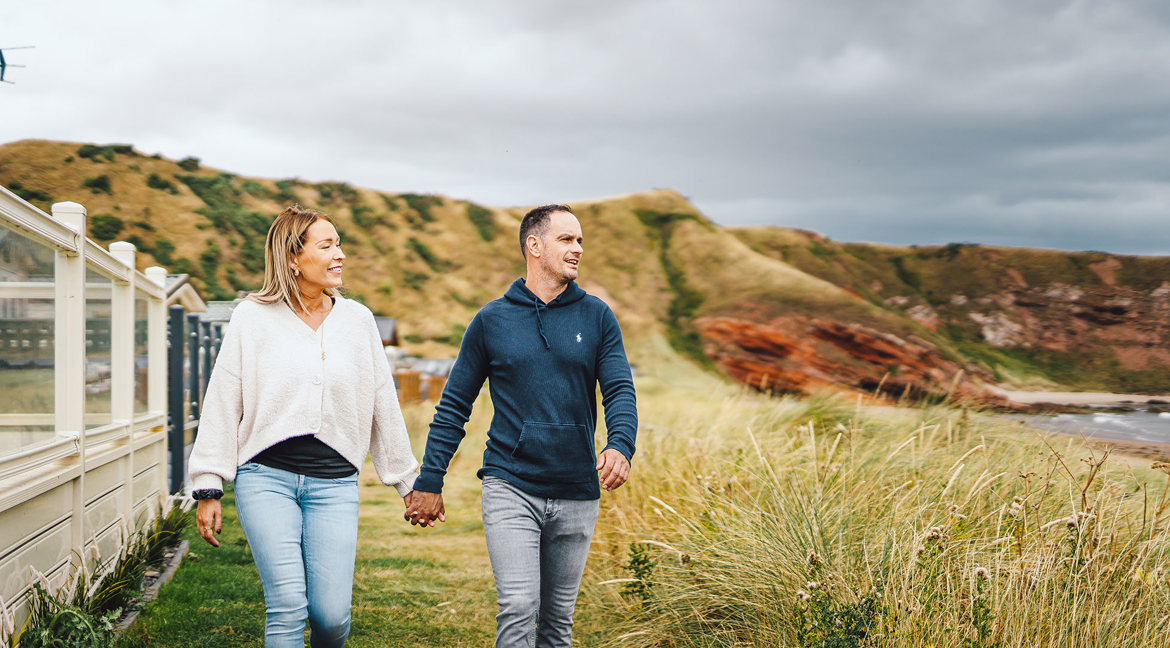 Couple walking at Pease Bay Leisure Park