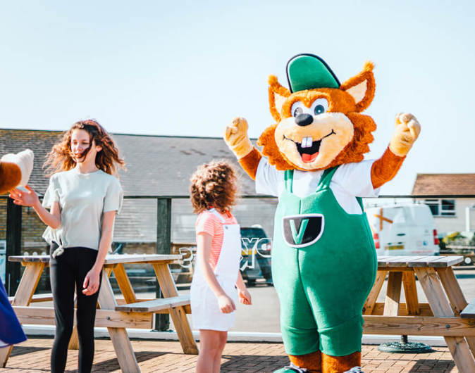 Vinnie the fox with child at Golden Coast